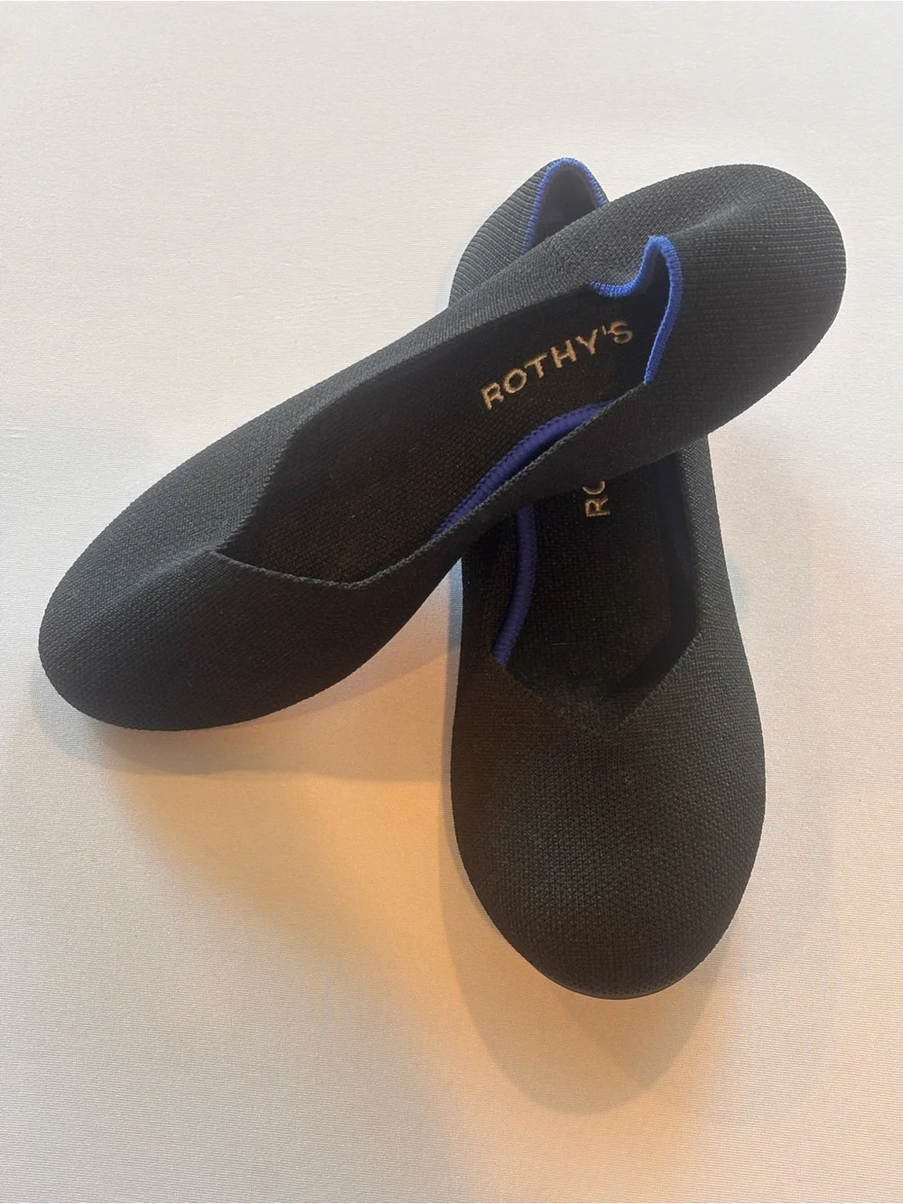Rothy's Black Knit Flats with Blue Trim